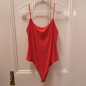 SHEIN red, ribbed body suit with spaghetti straps. NWOT.